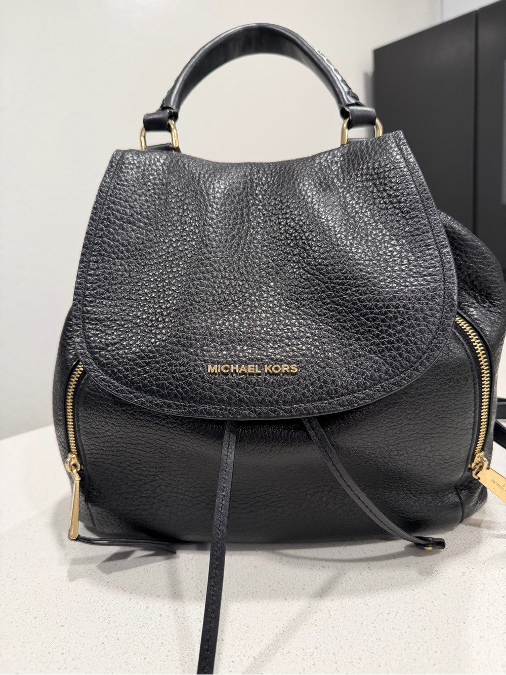 Michael Kors Black Pebbled Leather Flap Backpack